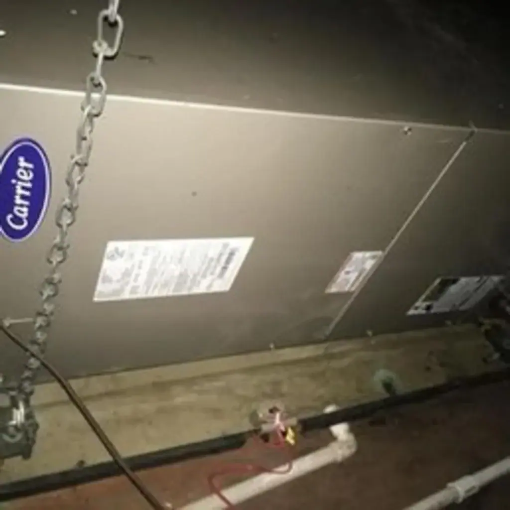 Air handler inspected before return-duct mold sanitizing in a White Plains, NY home