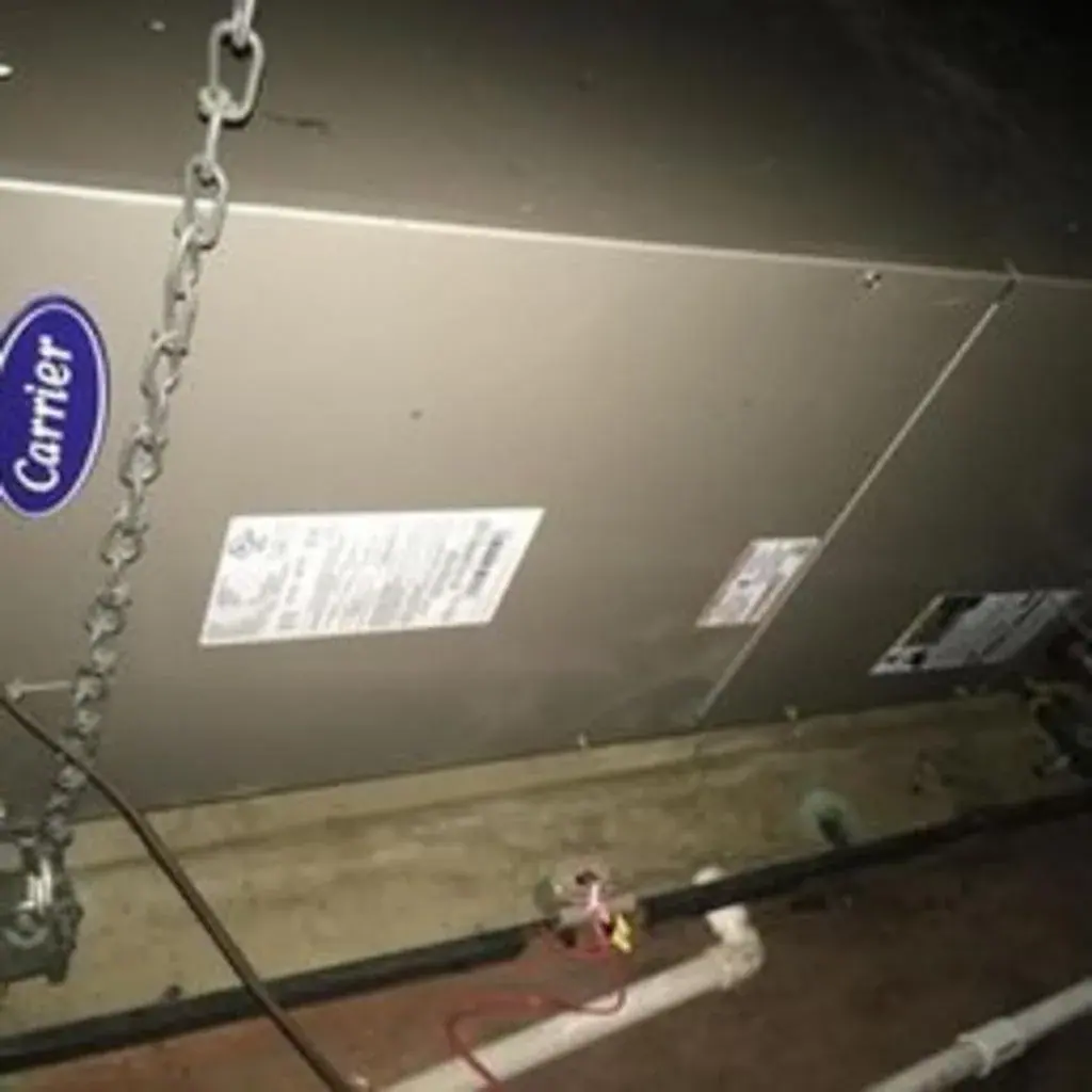 Carrier air handler with condensate drain line in a White Plains, NY home