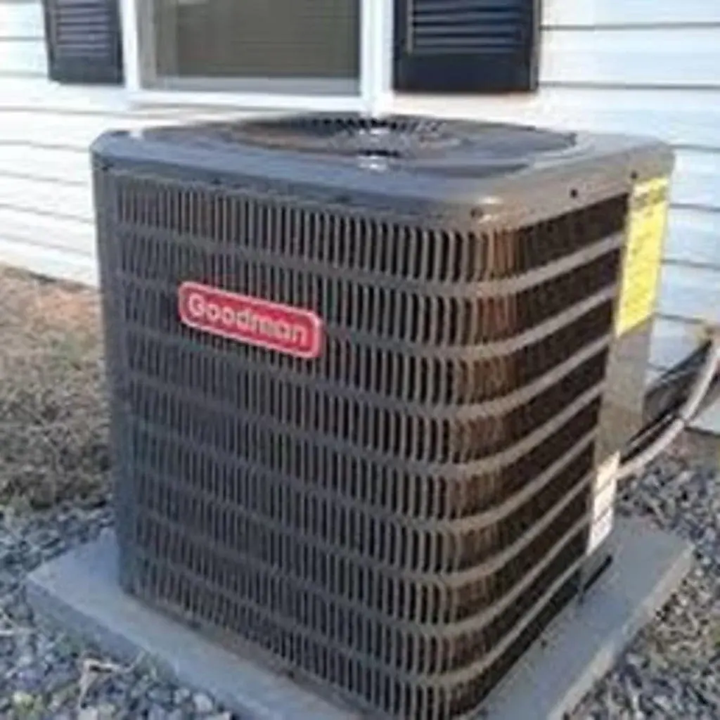 Goodman central air conditioning condenser beside a home in White Plains, NY