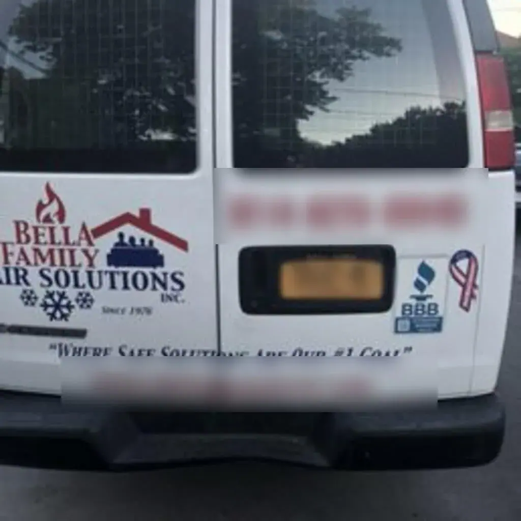Rear of a Bella Family Air Solutions van showing the “Where Safe Solutions Are Our #1 Goal” slogan and BBB logo